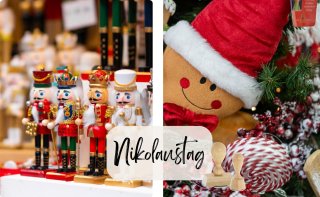 Verschiedene bunte Nussknacker und weihnachtliche Figuren auf einem deutschen Weihnachtsmarkt, daneben ein Plüschlebkuchenmann