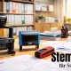 Trodat Stempel Professional 5460, Printy 4915 und Pocket Printy auf Schreibtisch im Schulsekretariat mit Formularen und Ordnern im Hintergrund
